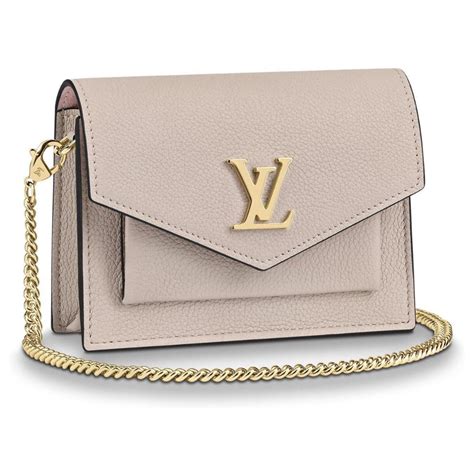 louis vuitton beige bag with gold chain|louis vuitton book chain wallet.